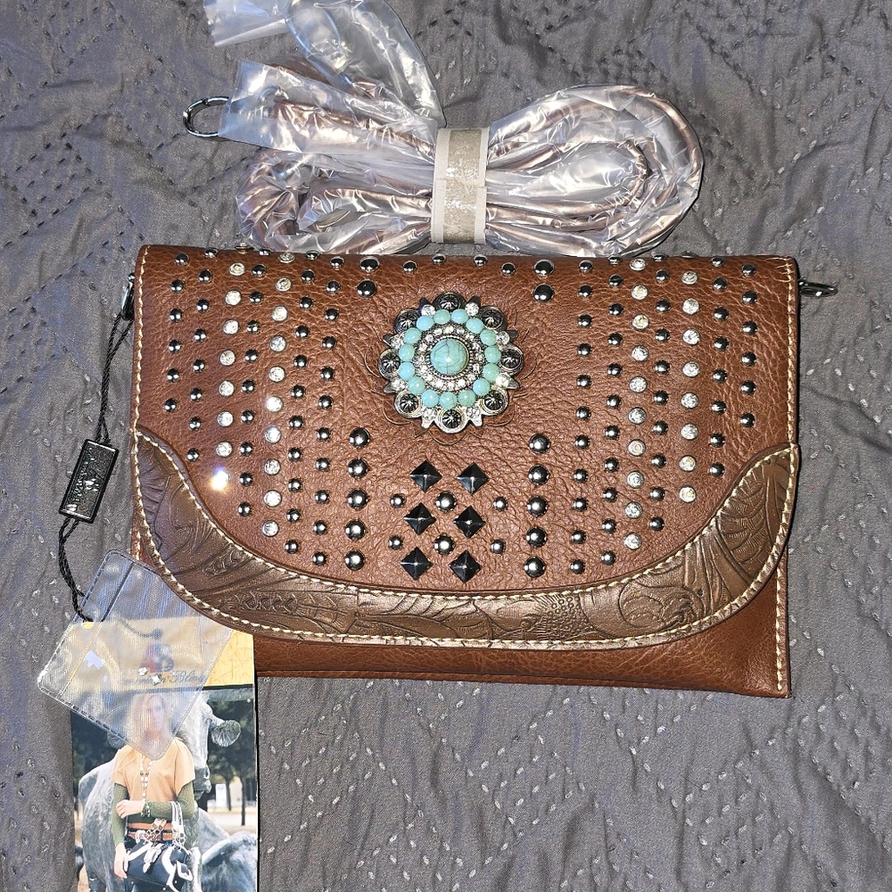 Shoulder clutch with strap.